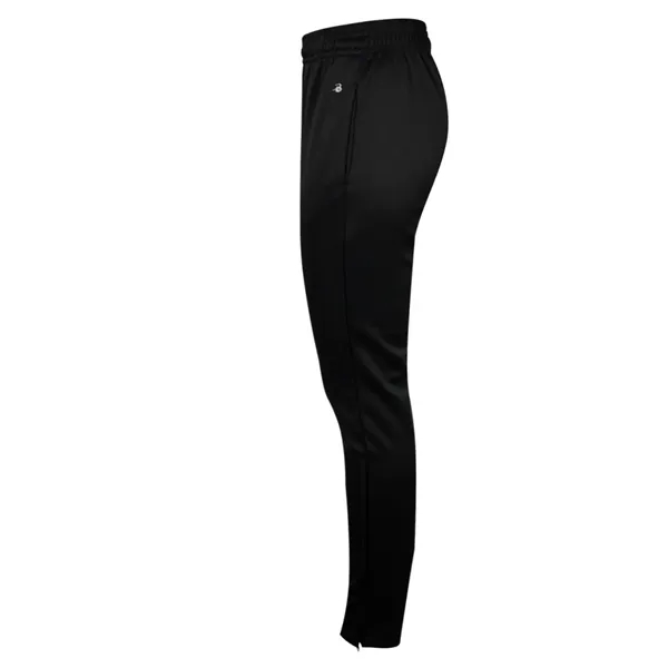 Women's trainer pants with tapered fit in lower leg, 12" zippers... from ASI 37461 Augusta Sportswear