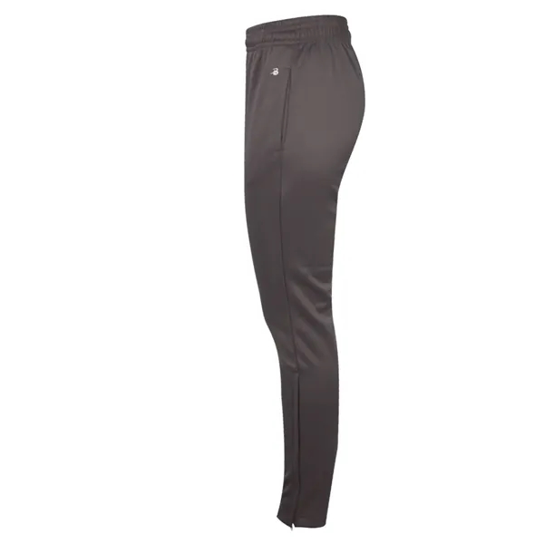 Women's trainer pants with tapered fit in lower leg, 12" zippers... from ASI 37461 Augusta Sportswear
