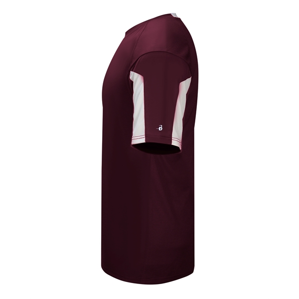 Striker tee with  self-fabric collar,  paneled shoulder for maximum... from ASI 37461 Augusta Sportswear