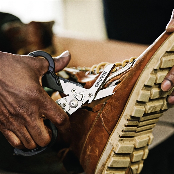 Multifunctional folding medical shears that include strap cutter, ruler, oxygen tank... from ASI 46170 Compass Industries Inc