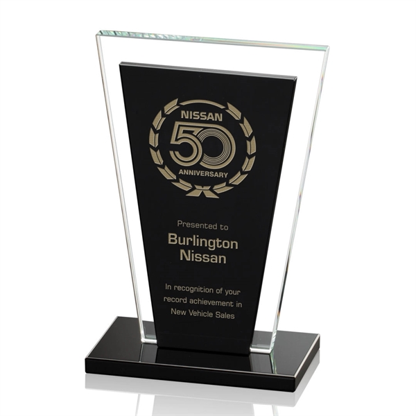 The solid black trapezoidal crystal shape of the Heckel is surrounded... from ASI 84592 St Regis Group / St Regis