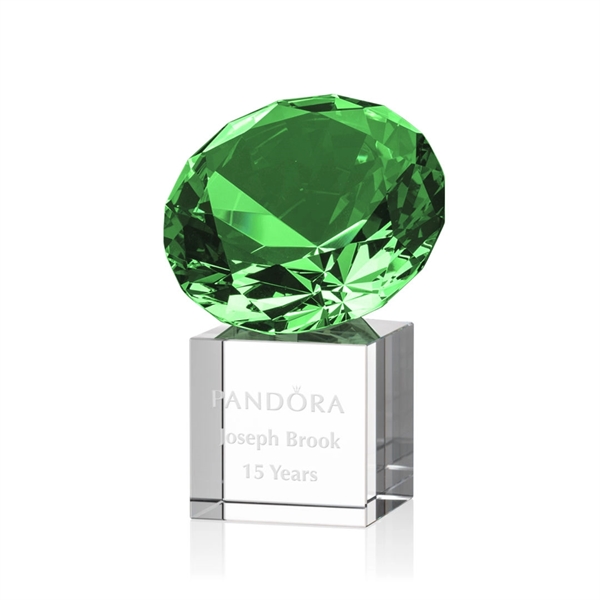 This award features a stunning emerald gemstone mounted onto a reflective... from ASI 84592 St Regis Group / St Regis