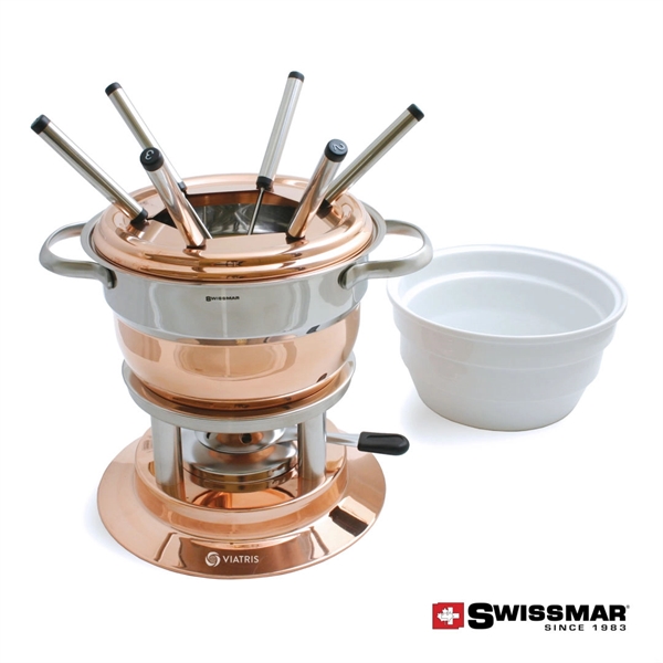 This multi-purpose fondue has a ceramic insert that acts as a... from ASI 84592 St Regis Group