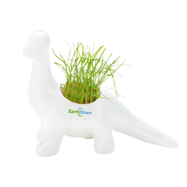 Dinosaur shaped planter made of ceramic and pre-loaded with seeded soil... from ASI 63549 Jornik Manufacturing Corp / Jornik
