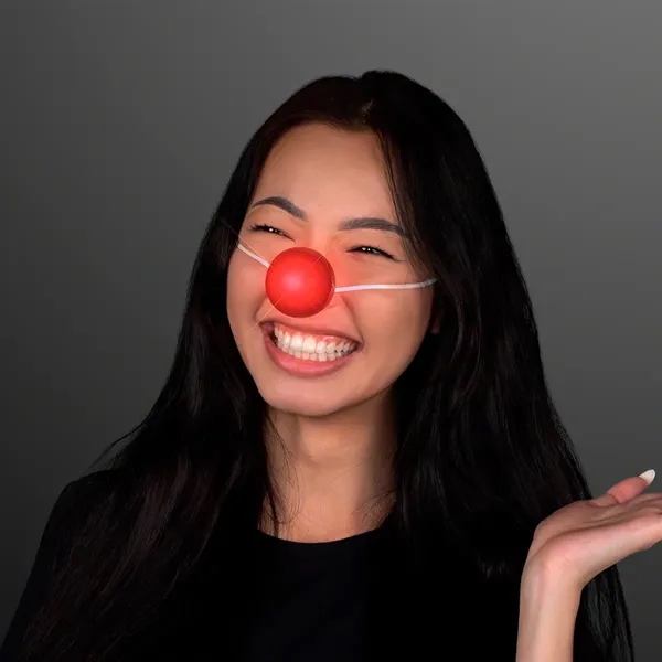 Light Up Red Clown Nose with Blinking LEDs with Flashing Red... from ASI 34194 ALightPromos / Alight Promotional Products