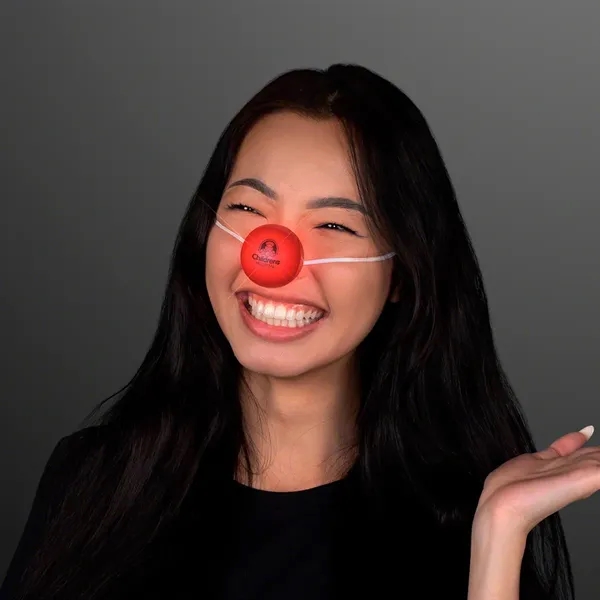 Light Up Red Clown Nose with Blinking LEDs with Flashing Red... from ASI 34194 ALightPromos / Alight Promotional Products