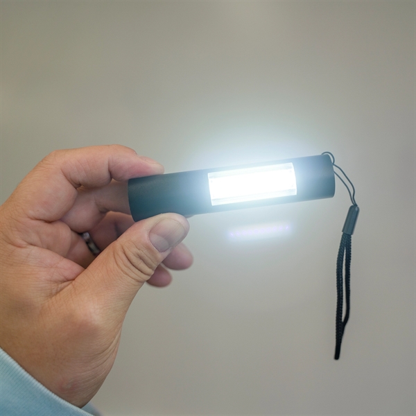 A rechargeable Cree COB LED flashlight with 2 settings and zoom.... from ASI 61966 HPG / Beacon Promotions