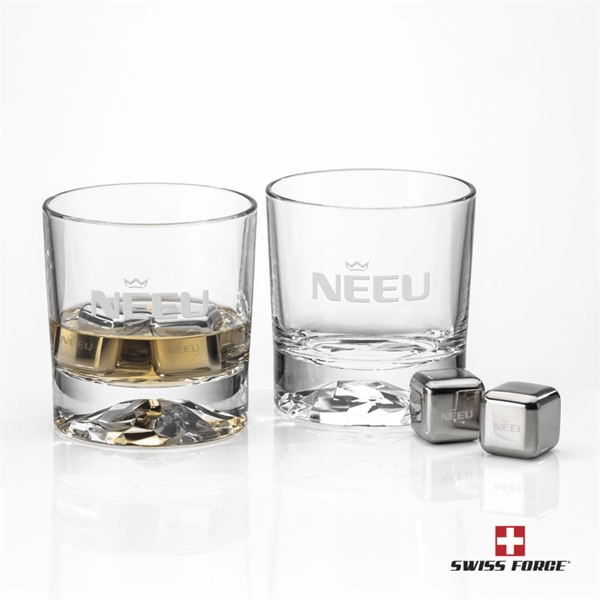 Crystalline on-the-rocks glasses are paired with a set of 4 stainless... from ASI 84592 St Regis Group