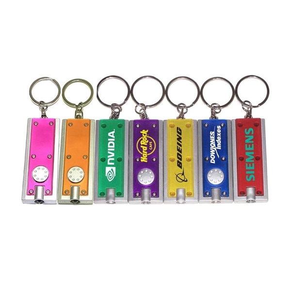 Slim rectangular flash light with swivel key chain, yellow.... from ASI 74585 Nu Promo International / Nu Promo Line