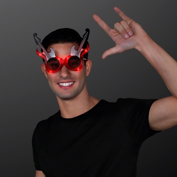 Blank or Imprinted. Light-up flashing guitar shaped sunglasses.... from ASI 34194 ALightPromos / Alight Promotional Products