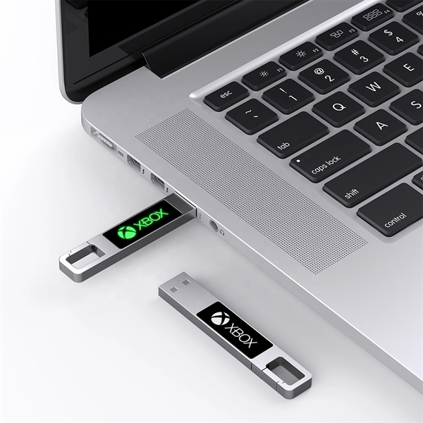 USB drive made of metal and plastic that lights up when... from ASI 63776 KTI Networks Inc