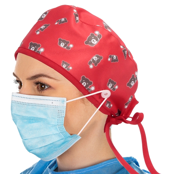 Surgical cap with tie in the back and button for face... from ASI 66230 Landes Inc