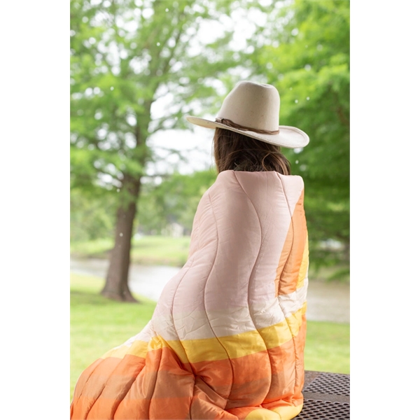 Our puffy quilted blanket works great indoors or out, and it... from ASI 74710 Numo