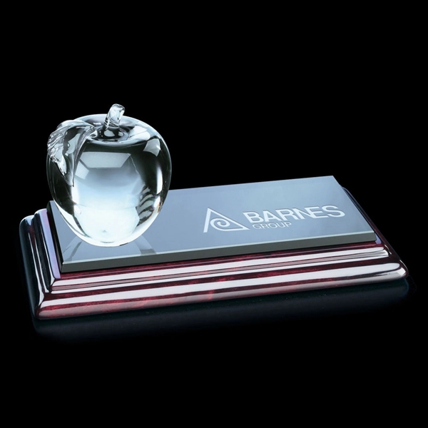 A colorless glass apple, approximately 2.75” in diameter, with molded stem... from ASI 84592 St Regis Group / St Regis