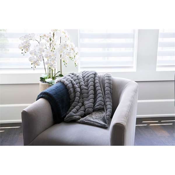 Plush, polyester throw blanket measuring 50" x 60"... from ASI 73520 Neet Feet / Kanata Blanket
