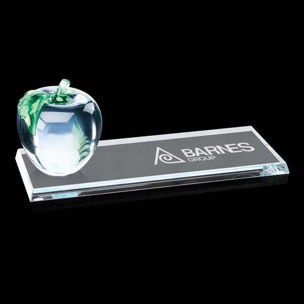 A colorless glass apple, approximately 2.75” in diameter, with molded stem... from ASI 84592 St Regis Group / St Regis