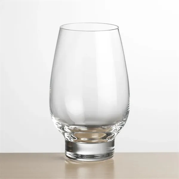 Contemporary Stemless Crystalline Footed Wine with a wide bowl anchored by... from ASI 84592 St Regis Group