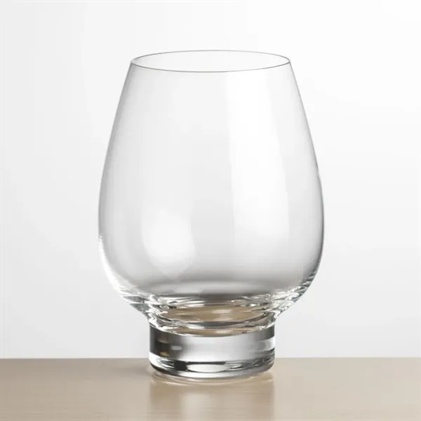 Contemporary Stemless Crystalline Footed Wine with a wide bowl anchored by... from ASI 84592 St Regis Group