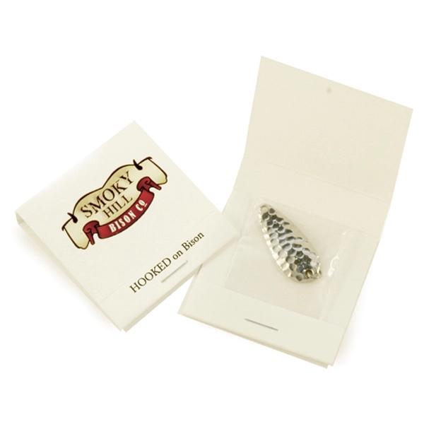 Bright nickel-plated hammered spoon freshwater fishing lure in matchbook packaging.... from ASI 33300 Al's Goldfish Lure Co