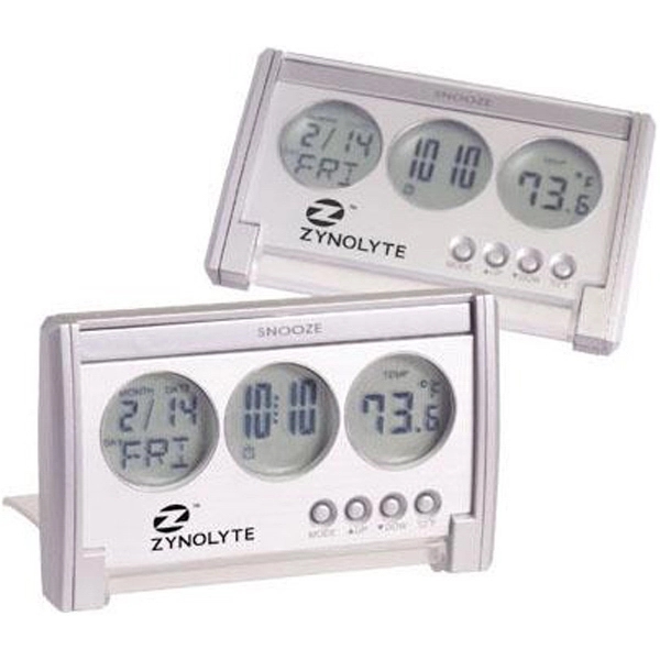 Compact LCD travel alarm clock with silver finish and a clear... from ASI 31570 Advantage Industries / AdVantage Line®