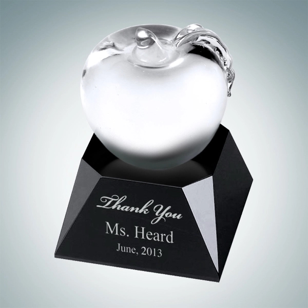 Clear molten glass apple with leaf sitting atop a black base.... from ASI 47791 Best Deal Awards / Best Deal Awards