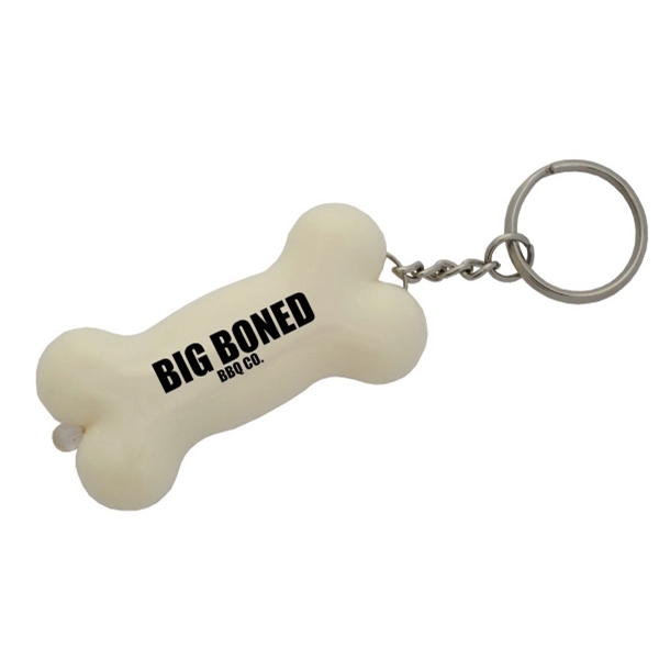 Dog bone shaped key tag in an ivory color and made... from ASI 92980 WOV-IN® / Promopet