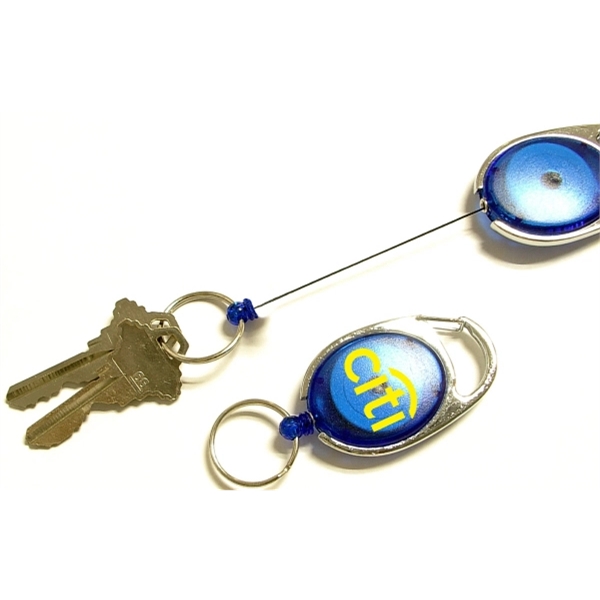 Oval shape retractable key holder with carabiner clip and key ring... from ASI 74585 Nu Promo International / Nu Promo Line