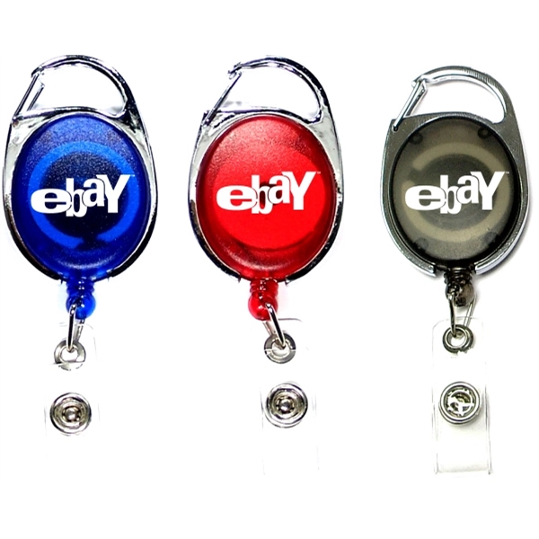 Oval shape retractable badge holder with carabiner clip... from ASI 74585 Nu Promo International / Nu Promo Line